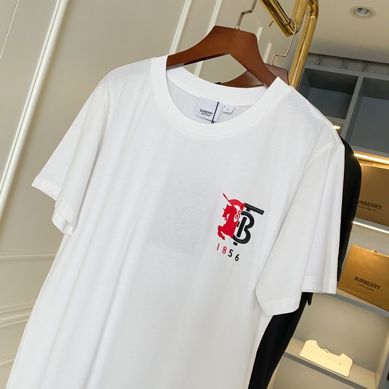 White Burberry logo T-shirt with red knight crest and black B icon