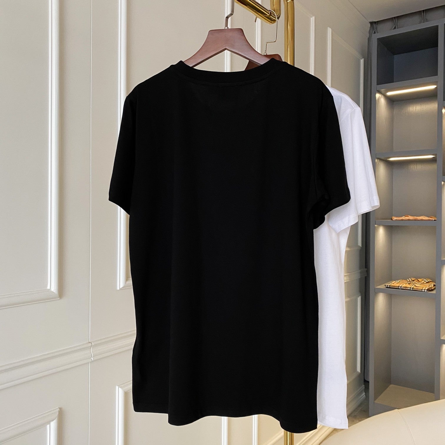 Burberry black short-sleeve T-shirt on hanger, crew neck and logo chest