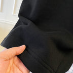 Black Burberry shorts with stitched hem and knit waistband edge