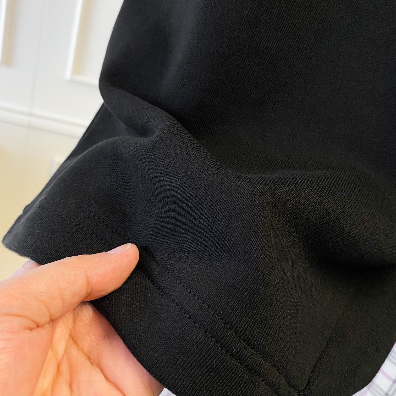 Black Burberry shorts with stitched hem and knit waistband edge