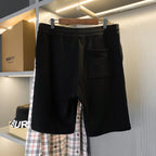 Black Burberry drawstring shorts with front pocket and relaxed leg opening