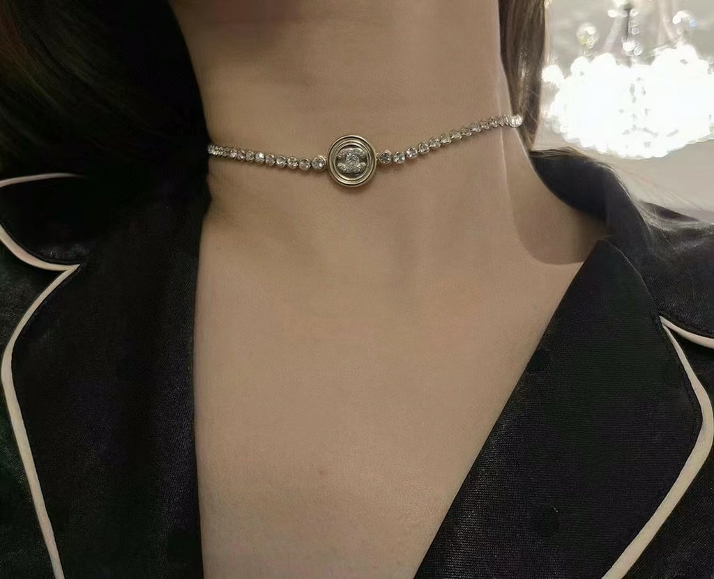 Rhinestone choker necklace with round logo medallion center pendant