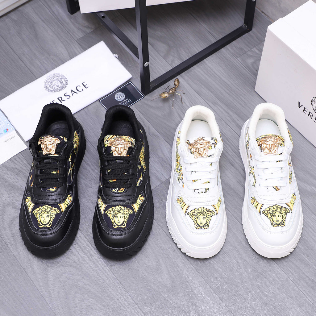 Versace luxury shoes, black with gold Medusa logos and lace-up front
