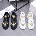 Versace luxury shoes, black with gold Medusa logos and lace-up front