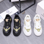 Versace luxury shoes, black with gold Medusa logos and lace-up front