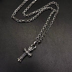Silver-tone cross pendant necklace with long chain and clasp
