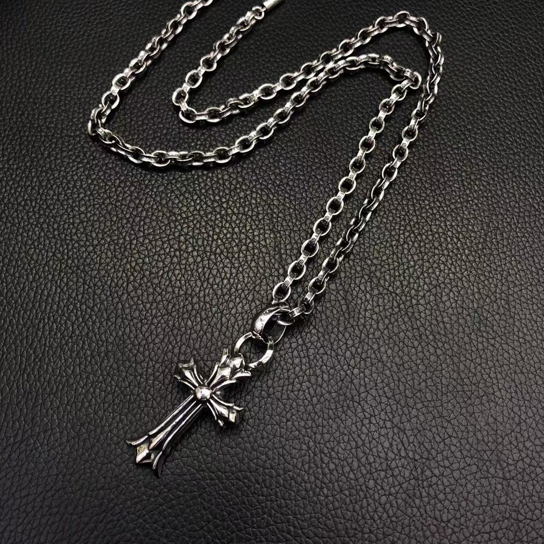 Silver-tone cross pendant necklace with long chain and clasp