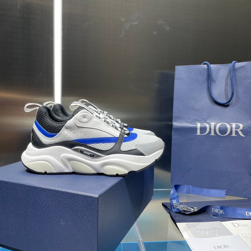 Dior unisex sneakers, white and black upper with blue trim, chunky lace-up sole