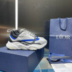 Dior unisex sneakers, white and black upper with blue trim, chunky lace-up sole