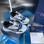 Dior unisex sneakers pair, white upper with black laces and blue side stripe