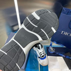 Dior unisex sneakers outsole, black tread with white midsole and blue accents