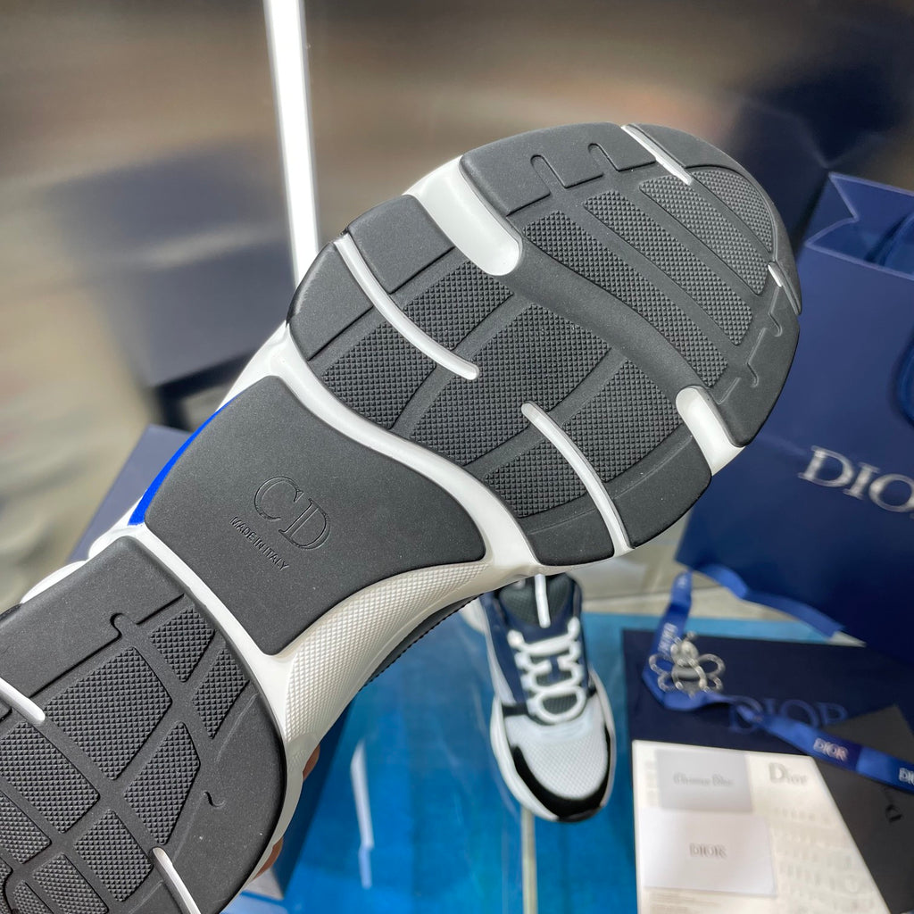 Rubber outsole of Dior sneakers with textured tread and curved sidewall