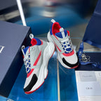 Dior unisex sneakers, white and blue upper with red heel trim, lace-up look