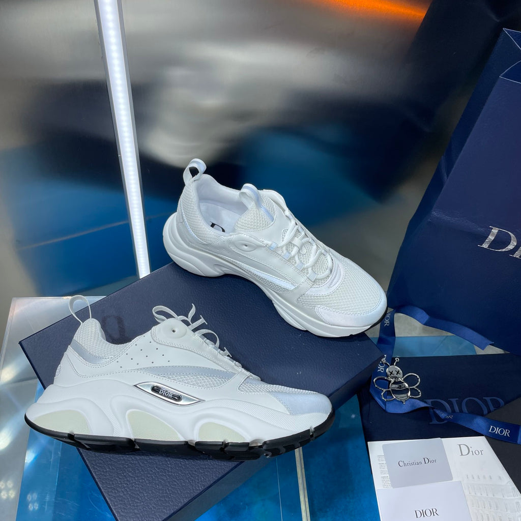 White lace-up sneaker with thick sole and perforated upper detail
