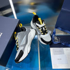 Unisex chunky sneakers, gray and black with yellow-striped laces and thick sole