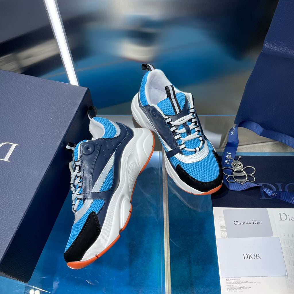 Dior unisex sneakers, blue mesh with navy panels, white sole and orange trim