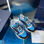 Dior unisex sneakers pair, blue and navy with white sole, lace-up design