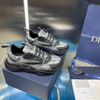 Pair of lace-up sneakers with silver logo-print panels and chunky black rubber sole