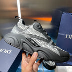 Silver logo-print low-top sneaker with gray molded sole, lace-up and round toe