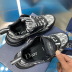 Silver logo-print sneakers with black laces and padded tongue, shown side and top
