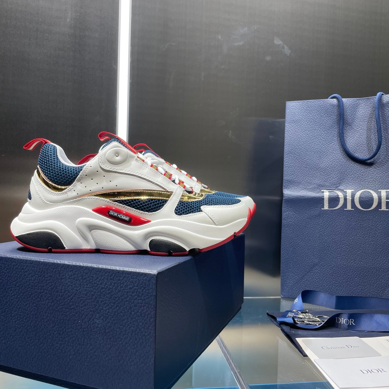 Dior unisex athletic sneakers, white leather with navy panels and red trim