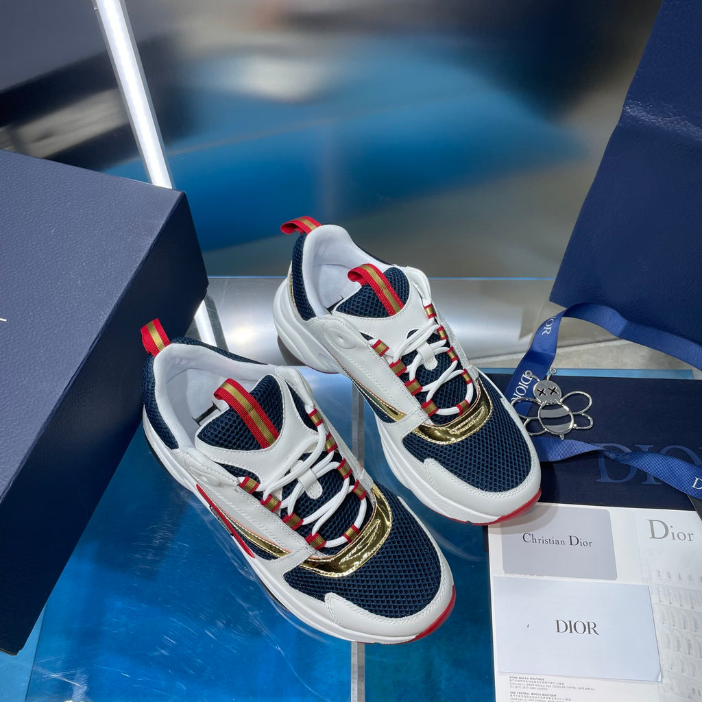 Dior unisex sneakers pair, white and navy with multicolor striped laces