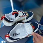 Dior unisex sneakers, white and navy with Dior logo detail on tongue