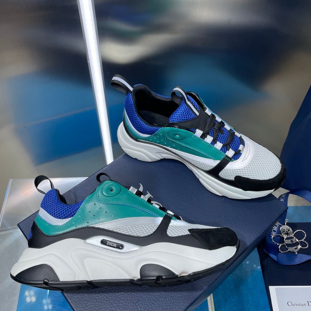 Dior unisex chunky sneakers in teal, blue, white, and black with lace-up design
