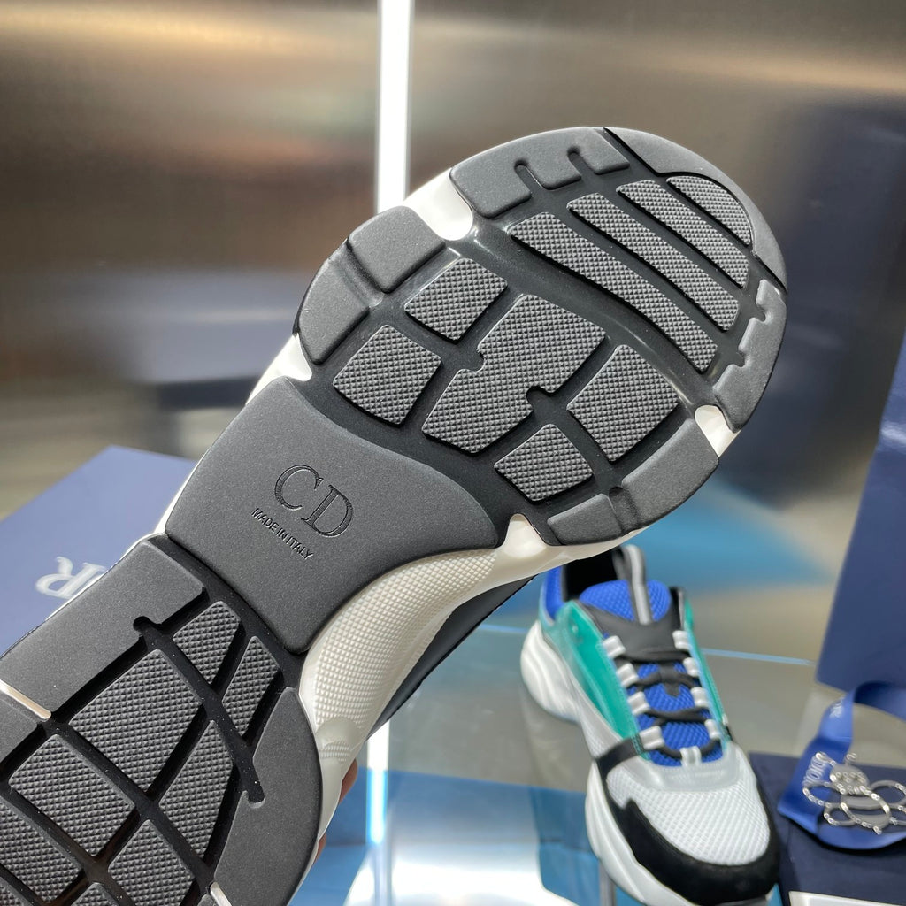 Dior sneaker outsole tread with CD logo on dark rubber