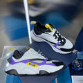 Chunky Dior unisex sneakers, black and white with purple and yellow accents