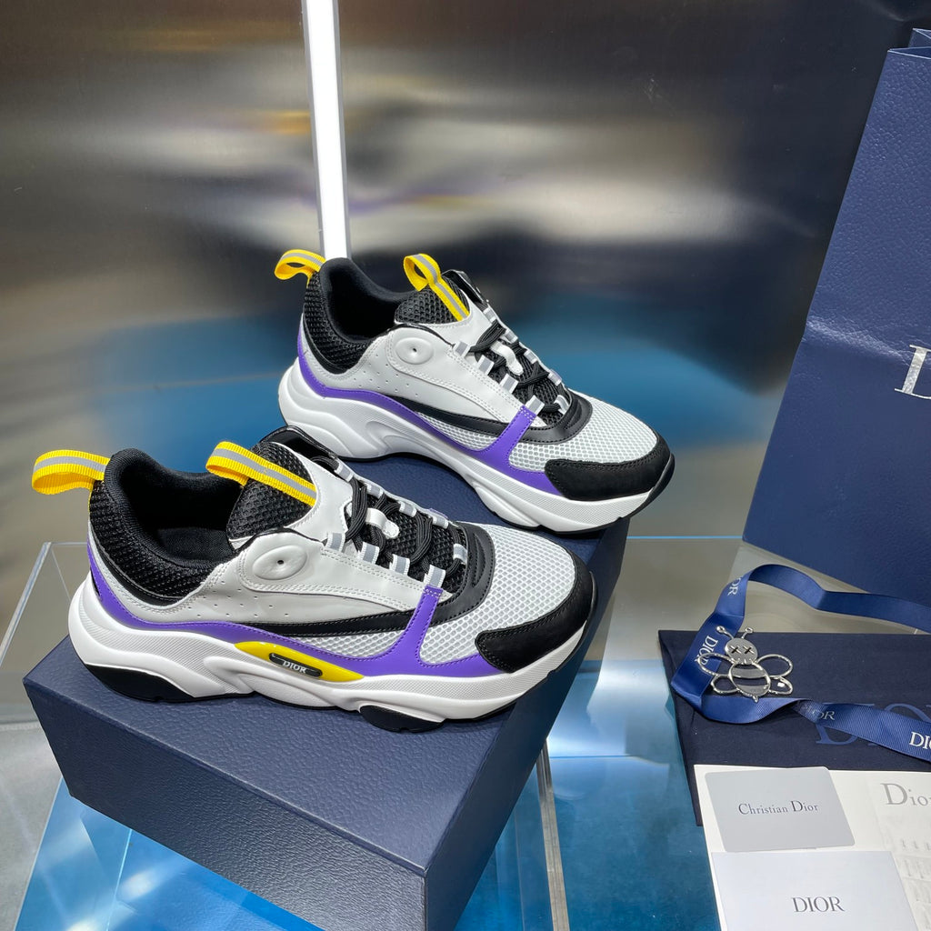 Dior chunky sneakers, white and black uppers with purple side stripe and yellow lace tabs