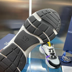 Dior sneakers outsole view, black tread with gray panels and white midsole