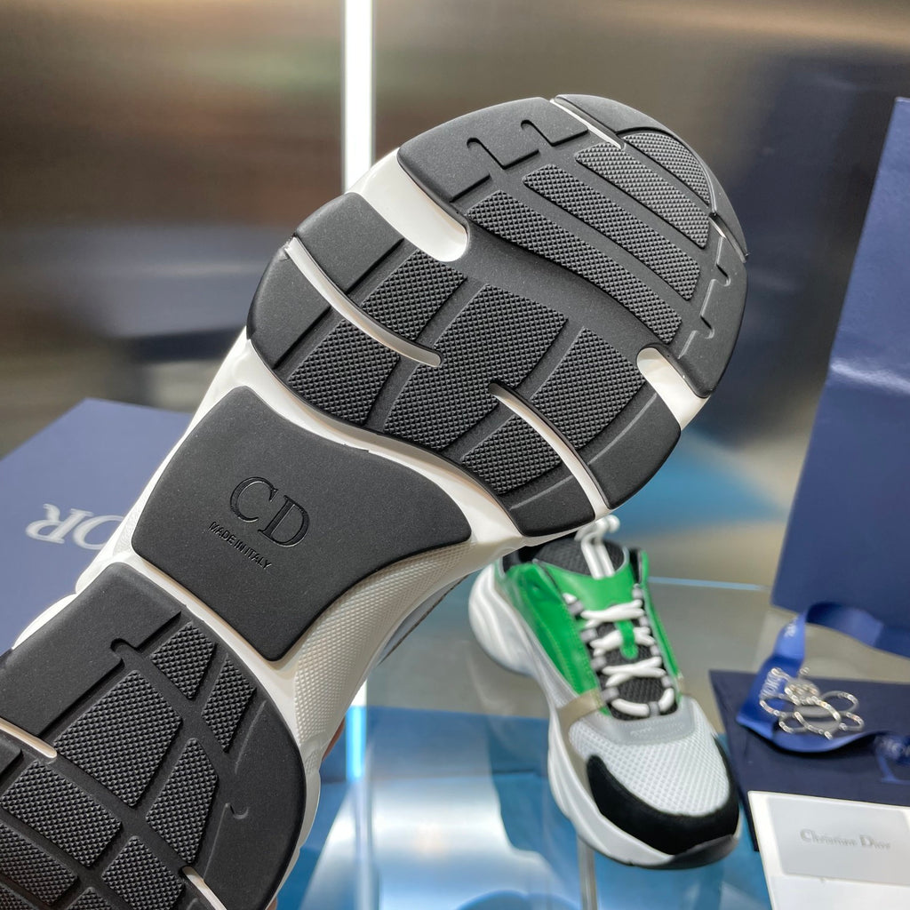Dior sneaker outsole with black rubber tread and white midsole