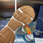 Dior unisex sneakers outsole view: tan rubber tread and white midsole