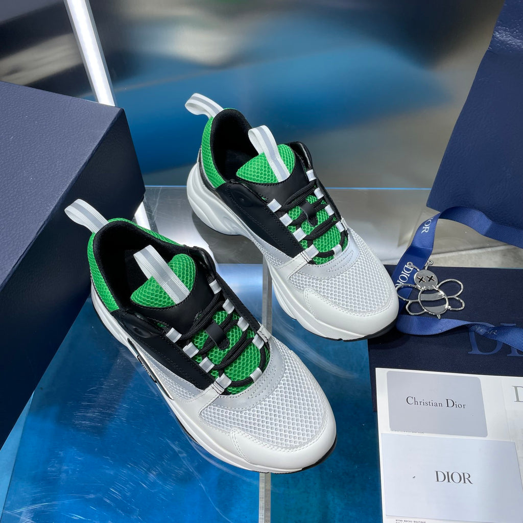 Dior unisex sneakers, two pairs view; white soles with black uppers and green laces
