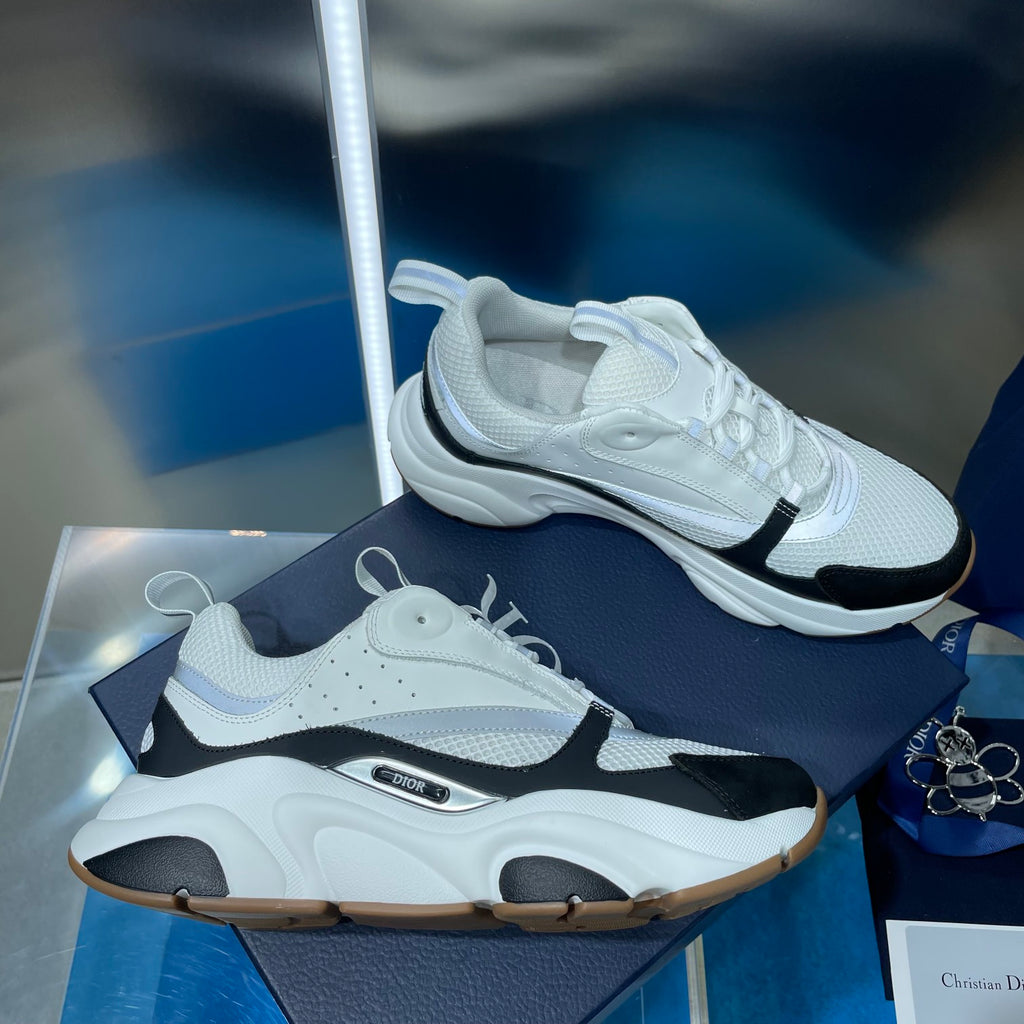 Unisex Dior sneakers, white knit upper with black side stripe and cushioned sole