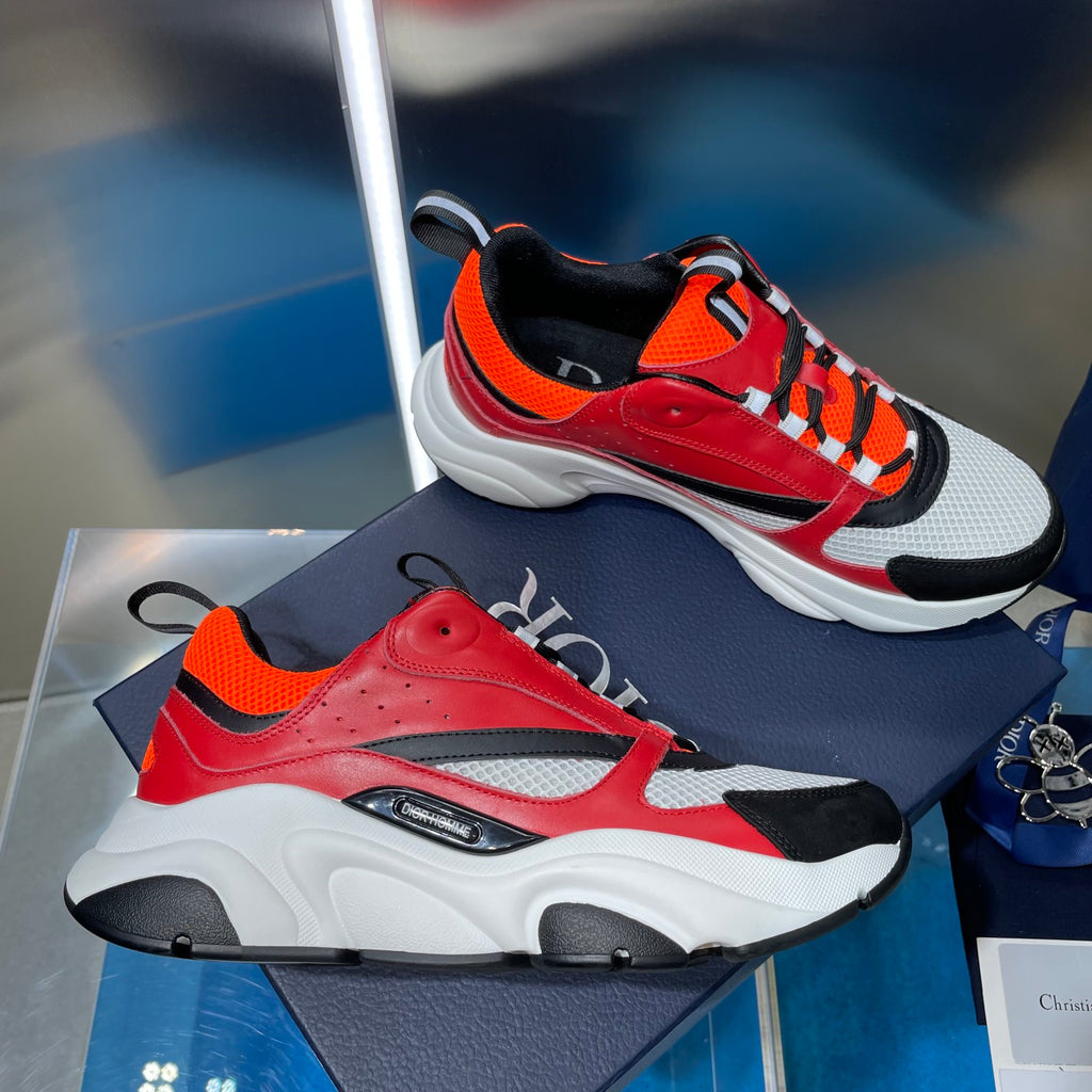 Dior chunky sneakers with red, orange, black and white mesh uppers