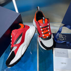 Dior chunky sneakers with red and orange uppers, black side panels and white sole