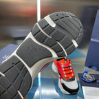 Dior chunky sneaker outsole with black tread and light gray midsole