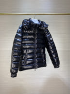 Dark puffer jacket with hood and full-zip front, quilted long sleeves