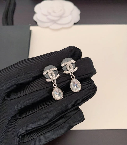 Silver-tone drop earrings with teardrop crystal stones