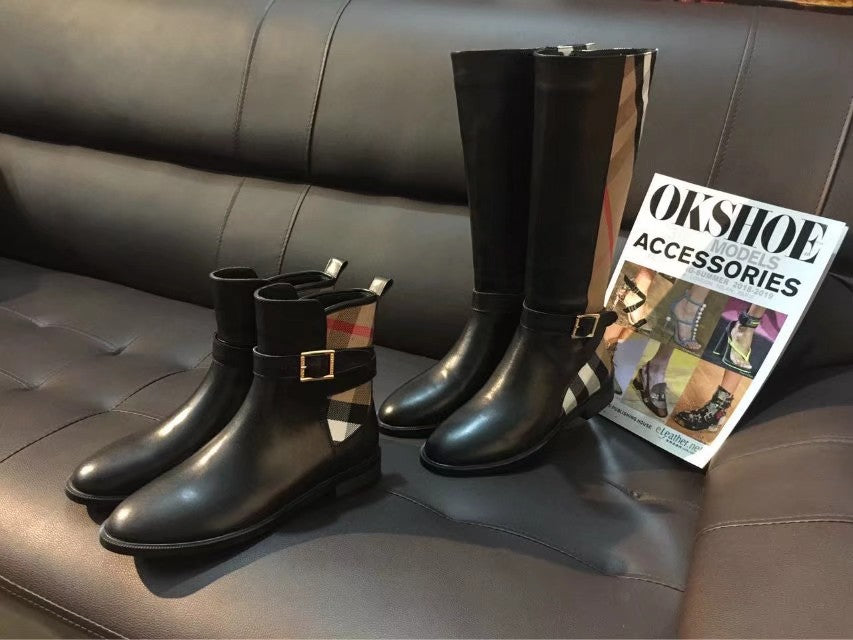 Pair of black leather boots: tall and ankle styles with gold-tone buckle details