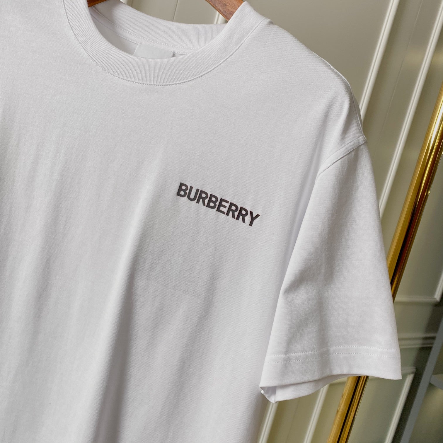 White Burberry crew-neck T-shirt with centered chest logo, short sleeves
