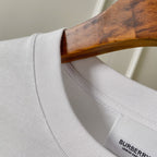 White Burberry T-shirt collar and inner neck label detail, close-up