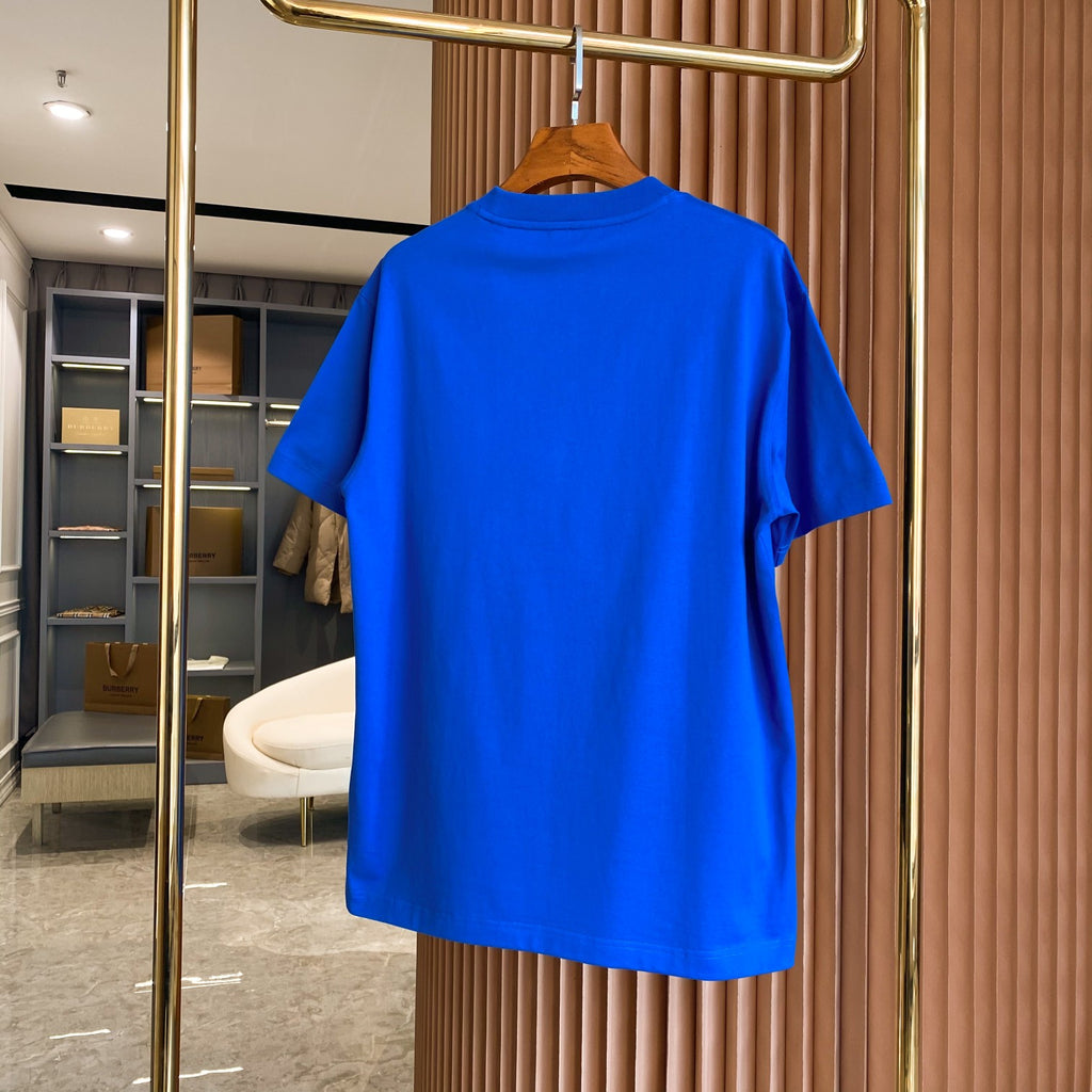 Men's blue short-sleeve T-shirt back view hanging on a wooden hanger.