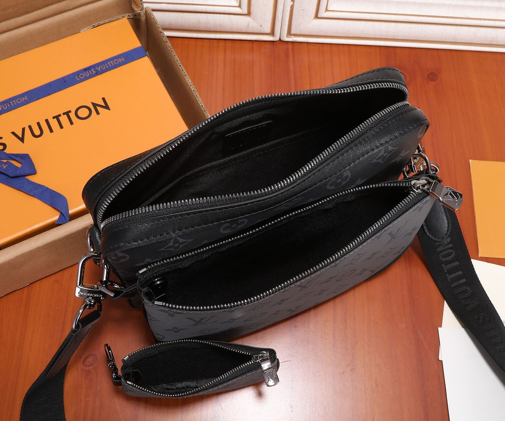 Louis Vuitton men's crossbody bag with top zipper, front pocket, and dark monogram canvas