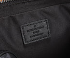 Louis Vuitton bag label on dark lining with printed brand and origin text