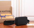 Louis Vuitton men's crossbody bag, black textured finish, front pocket and adjustable strap