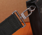 Louis Vuitton bag strap hardware with metal D-ring and clasp, black monogram fabric