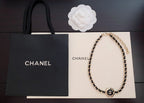 Gold-tone oval link chain necklace with CC logo medallion charm